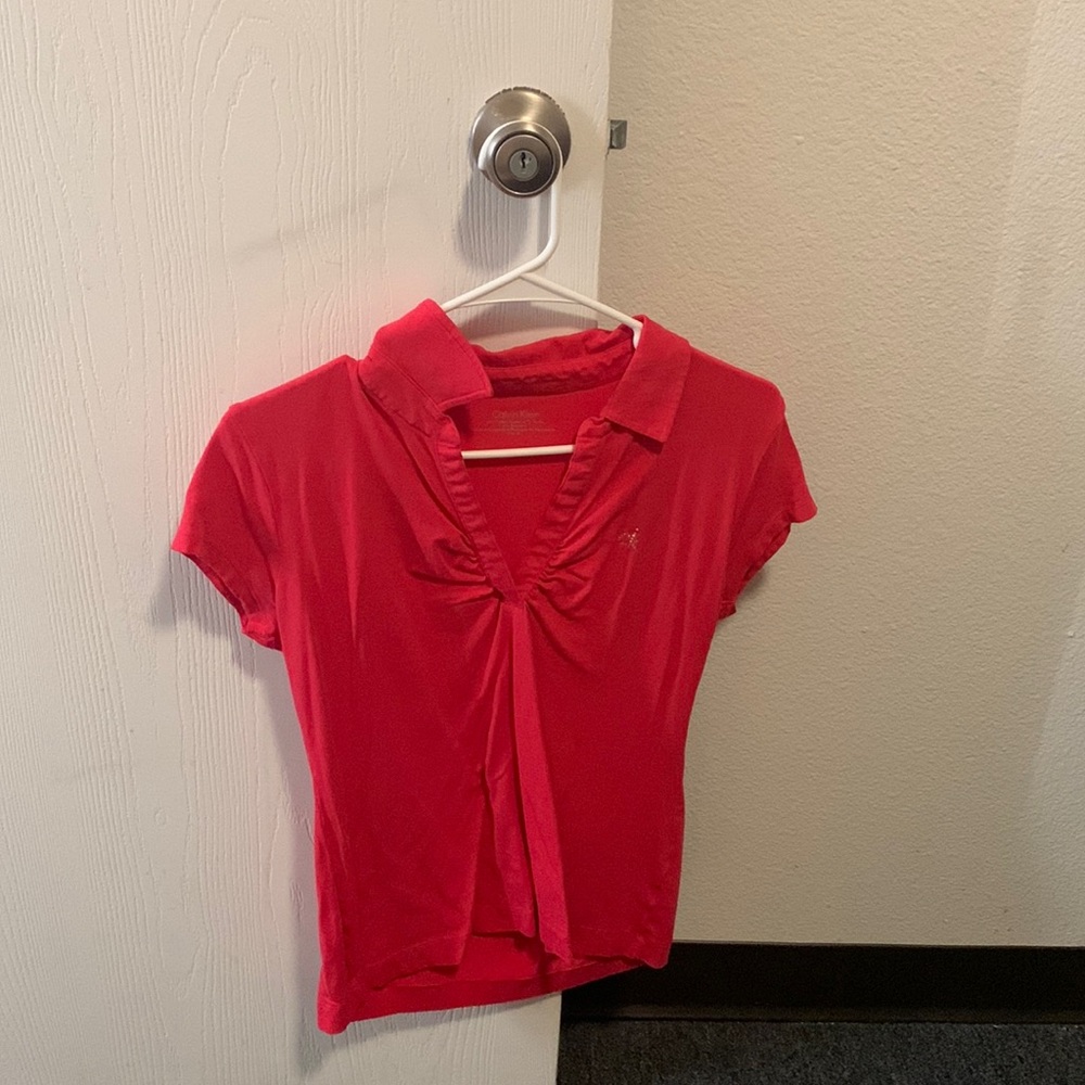 Calvin Klein button t shirt. size medium